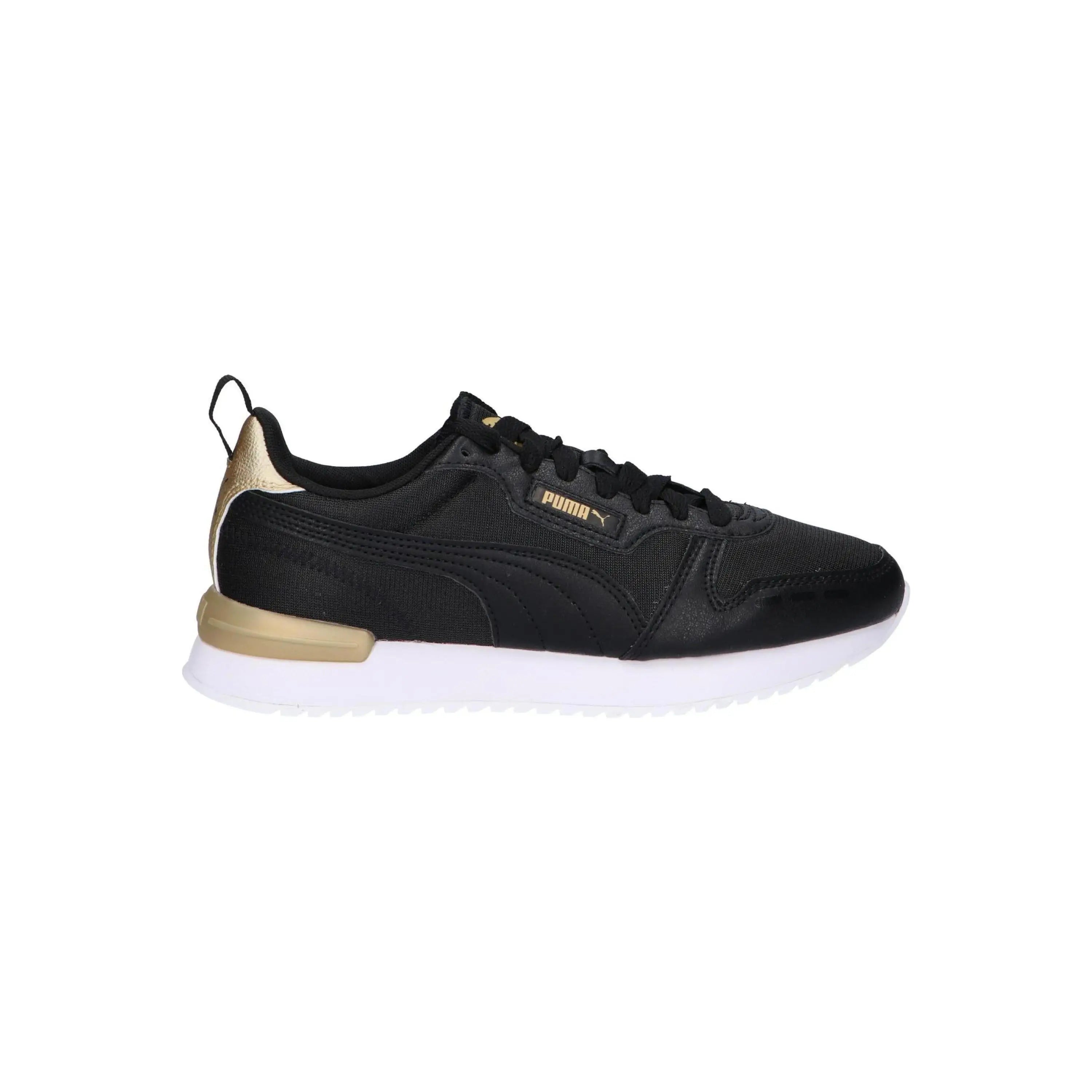 Puma women's casual sneakers in black, made of synthetic leather and canvas, featuring a comfortable textile lining and rubber sole, perfect versatile footwear for all seasons, ideal women shoes for everyday wear.